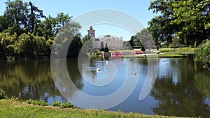 Lake with waterbirds in French chateau garden photo