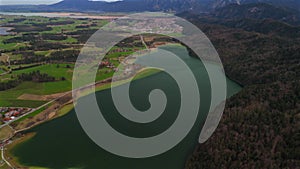 Lake Weissensee near Fuessen, Ostallgaeu, Allgaeu, Swabia, Bavaria, Germany. Weissensee Nature Park. Large beautiful