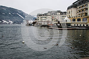 Lake Zeller See and elegant building, in Zell am See, Austria.