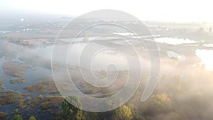 Lakes, artificially created water ponds for growing fish farming, morning mist