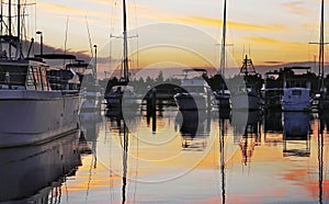 Lakes Entrance marina with moored boats at sunset.