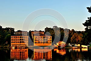 Lakeside buildings brightened up during sunrise