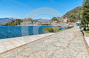 Lakeside promenade of city Laveno Mombello on the lake Maggiore shore in province of Varese.