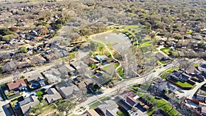 Lakeside residential neighborhood with bare trees wintertime suburbs Dallas Fort Worth metro complex, cul-de-sac dead
