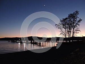 Lakeside Sunset Reflection at Twilight
