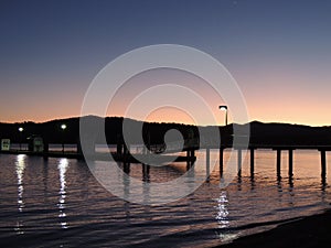 Lakeside Sunset Reflection at Twilight