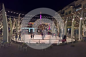 Outdoor ice skating rink at night