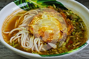 Laksa rice noodle with fried egg