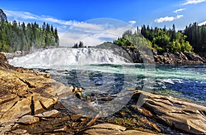 Laksforsen is a waterfall of 17 meters. Norway.
