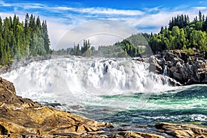 Laksforsen is a waterfall of 17 meters. Norway.