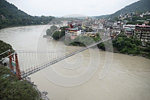 Lakshman Jhula a suspension bridge across the river Ganges. Bridge connects the villages of Tapovan to Jonk