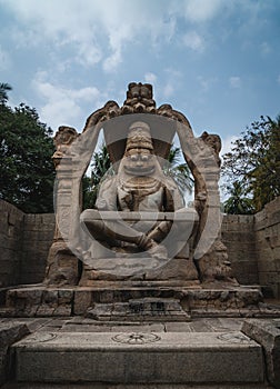 Lakshmi Narasimha Temple or Statue of Ugra Narsimha, Hampi karnakata india with cloudy sky