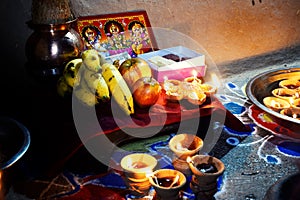 Lakshmi Pooja festival being celebrated at Indian home. Laxmi is also known as Goddess of wealth, picture for lakshmi puja. Diwali