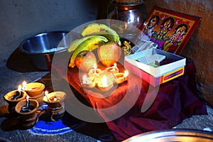 Lakshmi Pooja festival being celebrated at Indian home. Laxmi is also known as Goddess of wealth, picture for lakshmi puja. Diwali