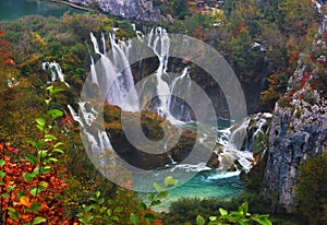 Lalake in forest with waterfall of national park Plitvice, Croatiarain