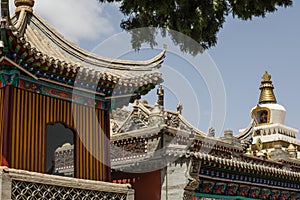 The Lama Temple and the white Buddhist pagoda