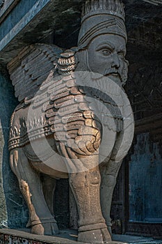 Lamassu sculpture - human-headed winged bull on the entrance to Fire temple in Fort Mumbai, Maharashtra