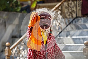 LAMAYURU, INDIA - SETEMBER 13, 2015: An unidentified buddhist lamas dressed in mystical mask dancing Tsam mystery dance in time of