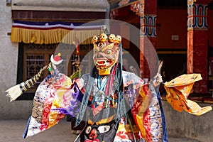 Lamayuru. Monk in mask performs buddhist sacred cham dance