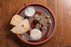 Lamb or beef curry with rice and raiti