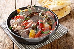 Lamb Buglama is a popular Azerbaijani and Georgian dish closeup in the bowl. Horizontal photo