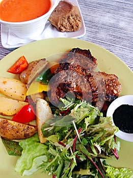 Lamb chop meal with soup and salad