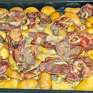 Lamb chops and baked potatoes