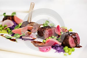 Lamb chops with pea and purple potatoes