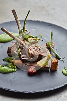 Lamb chops with vegetables and mint sauce