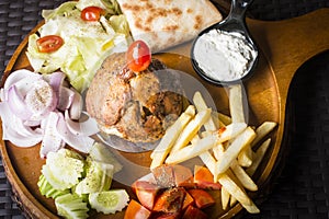 Lamb Gyros kebab served with bread,french fries and salad