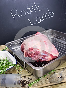 Lamb joint with ingredients and blackboard