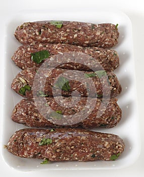 Lamb kofta on a supermarket tray