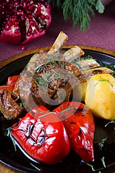 Lamb meat fried and served with vegetables