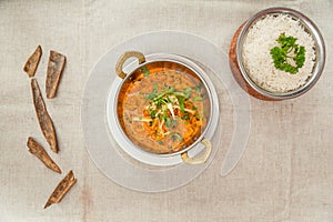 Lamb mughlai with white rice served in a dish isolated on table top view of indian spices food