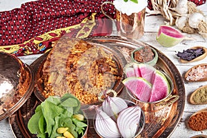 Lamb ribs on bulgur pilaf. Stuffed Ribs isolated on black background. Turkish name;