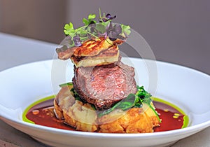 Lamb Rump medium, creamy garlic mash, haloumi photo