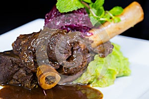 Lamb shank braised in an onion jus