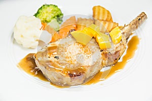 Lamb steak with sauce and potato