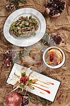 Lamb Tongues with Pomegranate, Pickled Cabbage and Hummus with Eggplant