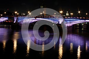 Lambeth bridge illuminated river thames