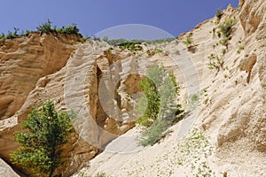 Lame Rosse in the Sibillini`s mountains. Stratifications of rock in the shape of pinnacles and towers consisting of gravel held