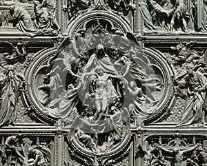 Lamentation of Christ, detail of the main bronze door of the Milan Cathedral photo