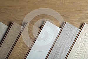 Laminate background. Samples of laminate or parquet with a pattern and wood texture for flooring and interior design