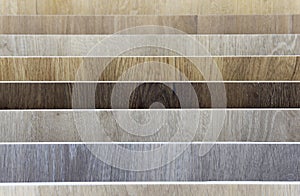 Laminate background. Samples of laminate or parquet with a pattern and wood texture for flooring and interior design. Production