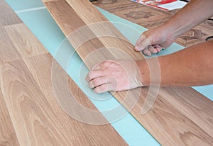 Laminate flooring installation. Installing wooden Laminate Flooring