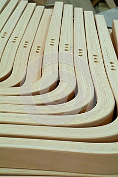 Laminated, wooden parts for furniture production photo