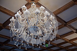 The lamp in the beautiful room .Brass chandelier with crystal. Chandelier ceiling lights . Chandelier Lamp beautiful luxury