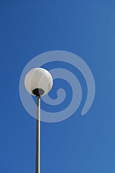 Lamp and blue sky