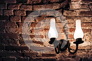 Lamp on a brick wall