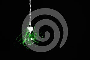 Lamp bulb hanging on the rope. New idea concept. Green shadows